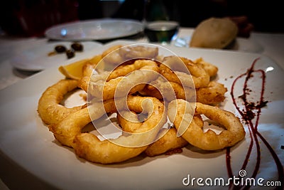 Fried Squid Rings or Calamares a la Romana in a white plate Stock Photo