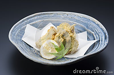 Fried tempura vegetables with fresh lime in platter Stock Photo