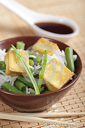 Fried tofu with rice and vegetables Stock Photo