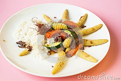 Fried vegetable, beef and rice. Stock Photo