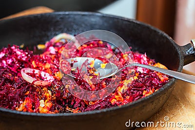 Fried vegetables on a frying pan Stock Photo