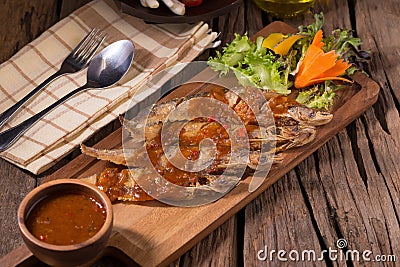 Fried Whisker sheat fish with chili sauce Stock Photo