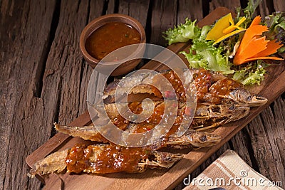 Fried Whisker sheat fish with chili sauce Stock Photo