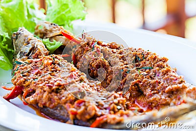 Fried whisker sheat fish with chili sauce Stock Photo