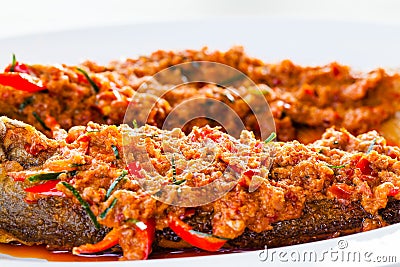 Fried whisker sheat fish with chili sauce Stock Photo