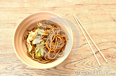 fried yakisoba Japanese noodles and cabbage in spicy sauce on bowl Stock Photo