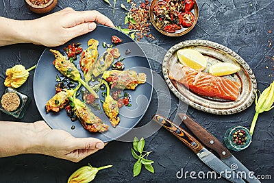 Fried zucchini flowers stuffed fish Stock Photo
