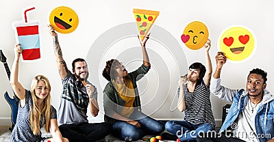 Friend with different emojis cut out Stock Photo