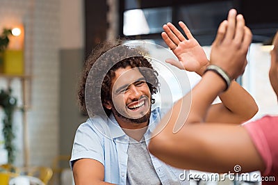 Friend giving high five Stock Photo