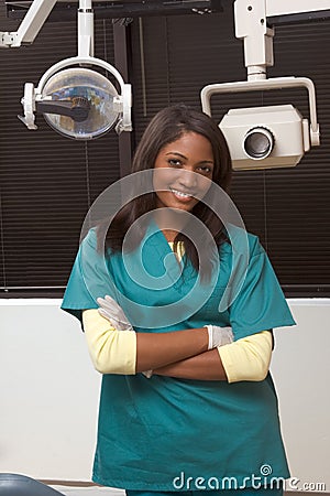 Friendly African-American dentist woman in office Stock Photo