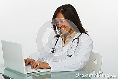 Friendly Asian doctor smiling. Stock Photo