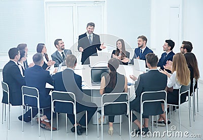 friendly business team applause greeted his boss before the busi Stock Photo