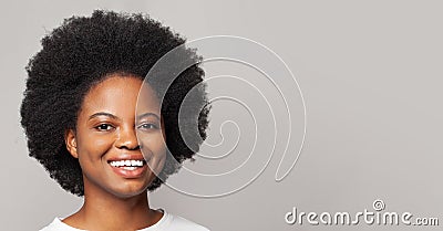 Friendly cheerful attractive curly-haired young woman smiling pleasant, having fun, enjoying. Closeup studio portrait Stock Photo
