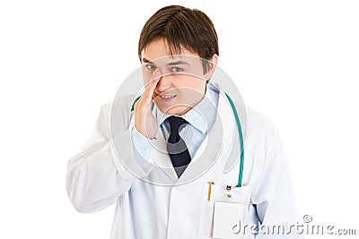 Friendly doctor secretly reporting good news Stock Photo