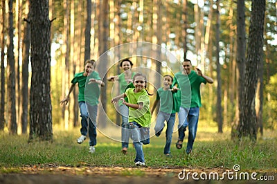 Friendly family running Stock Photo