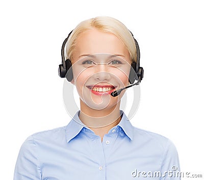 Friendly female helpline operator with headphones Stock Photo