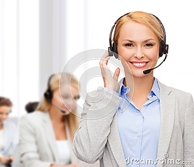 Friendly female helpline operator at office Stock Photo