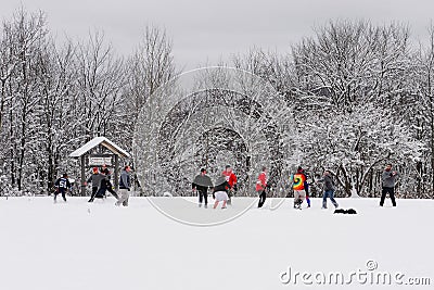 Friendly game of American football in the snow Editorial Stock Photo