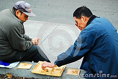 Friendly Game of Xiangqi Editorial Stock Photo