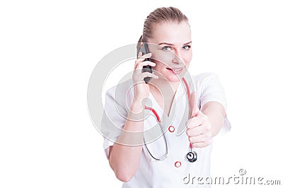 Friendly hospital contact person showing like gesture Stock Photo