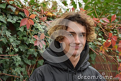 Friendly laughing teenage boy Stock Photo