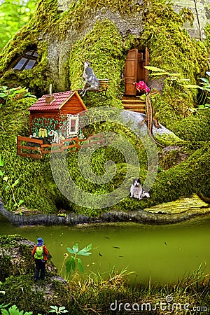 A friendly life of forest dwellers in their homes follow mosses. A children`s collage about the life of animals Editorial Stock Photo