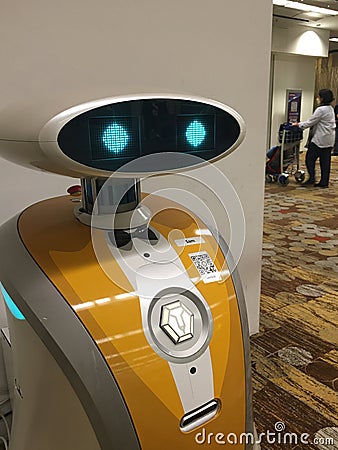 Friendly robot and Changi Airport Singapore Editorial Stock Photo