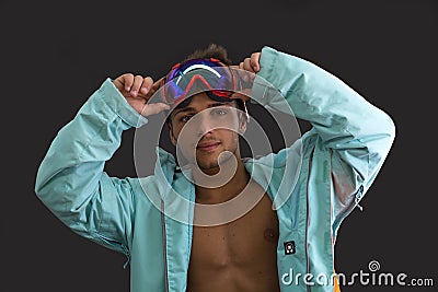Friendly skier or snowboarder with open jacket Stock Photo