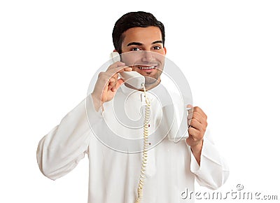 Friendly smiling ethnic businessman on telephone Stock Photo