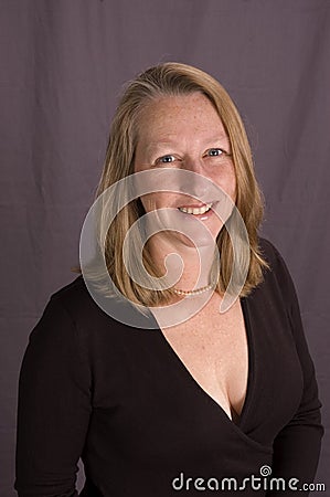 Friendly smiling middle-aged woman Stock Photo