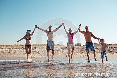 Friends on the beach. Have fun at sunny summer day Stock Photo