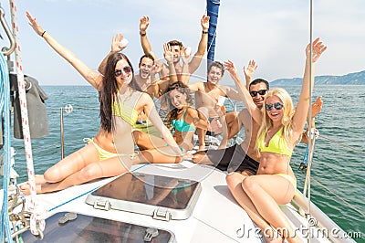 Friends on boat having party Stock Photo