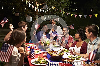 Friends Celebrating 4th Of July Holiday With Backyard Party Stock Photo