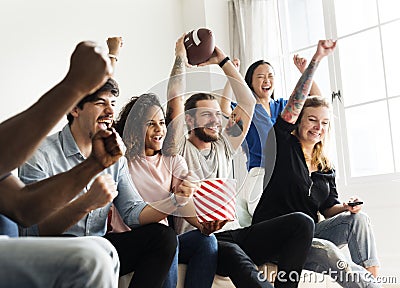 Friends cheering sport league together Stock Photo