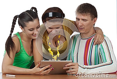 Friends with computer tablet Stock Photo