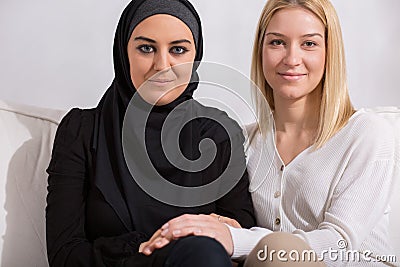 Friends of different religion Stock Photo