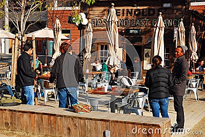 Friends hang out at the First and Last Chance Saloon Editorial Stock Photo