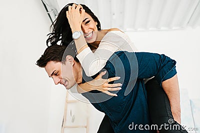 Friends of a man and a woman having fun. Friendship, rest, time together, fool around. Stock Photo