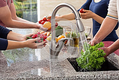 Friends preparing dinner Stock Photo