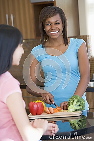 Friends Preparing A Meal Stock Photo