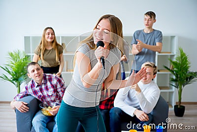 Friends singing a song together Stock Photo
