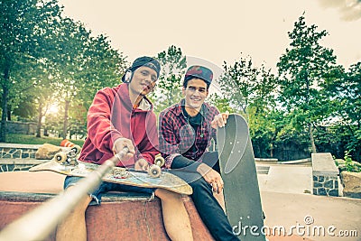 Friends in a skate park Stock Photo