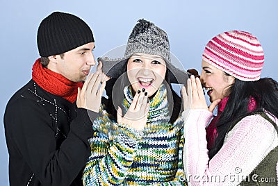 Friends telling secrets and laughing Stock Photo