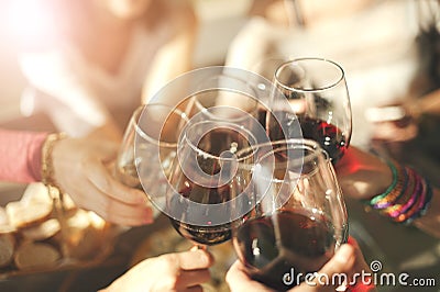 Friends toasting with wine Stock Photo