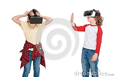 Friends in virtual reality headsets Stock Photo