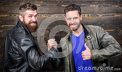 Friendship of brutal guys. Handshake symbol of successful deal. Approved business deal. Handshake gesture meaning. Have Stock Photo