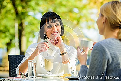 Friendship friendly relations. Discussing rumors. Trustful communication. Friendship sisters. Friendship meeting Stock Photo