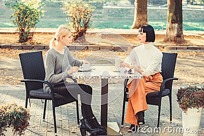 Friendship friendly relations. Discussing rumors. Trustful communication. Friendship sisters. Friendship meeting. Female Stock Photo