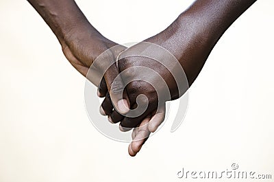 Friendship Symbol: Black People Holding Hands Together Stock Photo