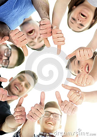 Friendship, youth and people concept - group of smiling teenagers with hands on top each other Stock Photo